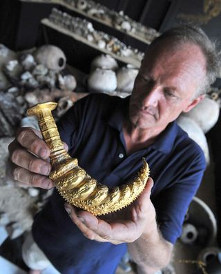 Prominent archaeologists have identified this artifact as "some terrible shovel tool that can't dig for shit."